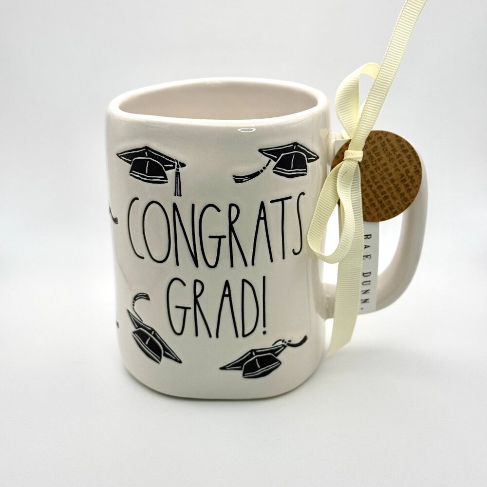 CONGRATS GRAD coffee mug with adorned graduation cap pattern by Rae Dunn